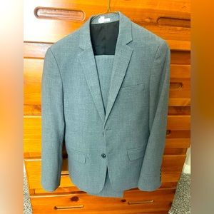 BOYS CALVIN KLEIN SUIT. JACKET AND PANTS. SIZE 14. EXCELLENT CONDITION WORN ONCE